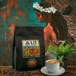 ALii Kona Coffee bag with a cup of coffee on a wooden surface with a natural background